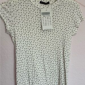 Brandy Melville Cream Ribbed Fitted Hailie purple eyelet floral T-Shirt